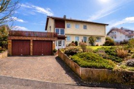 Hauptbild GLOBAL INVEST SINSHEIM | Tolles freistehendes Einfamilienhaus mit Einliegerwohnung und Doppelgarage in Grombach